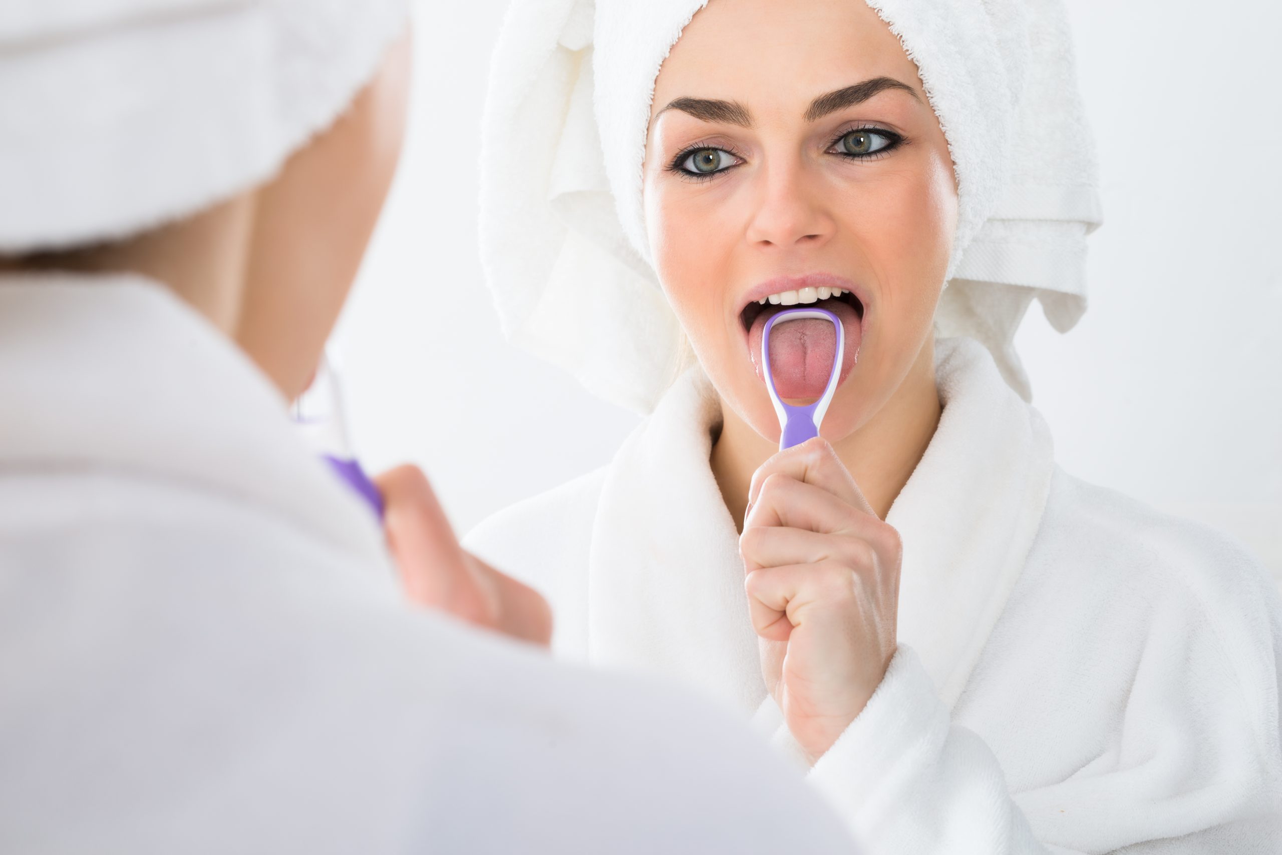Should I Be Using a Tongue Scraper? | Dentist 98226